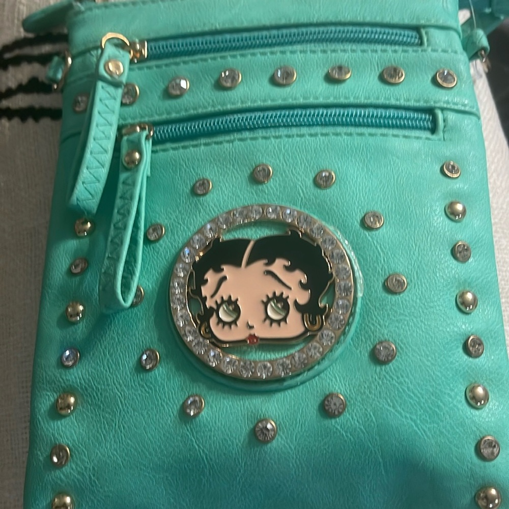 Cute NWT Betty Boop crossbody with tags. Beautiful mint color